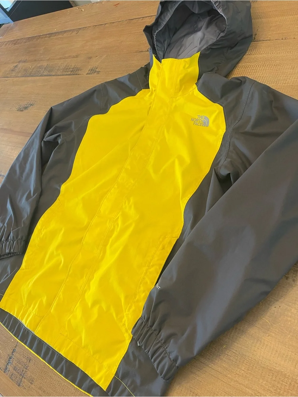 The North Face bright yellow